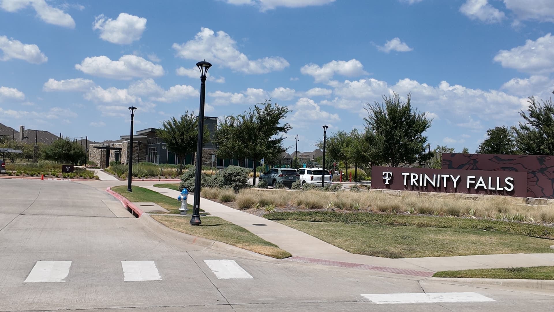 Trinity Falls entry monument, welcome center and landscaped grounds in McKinney, Texas