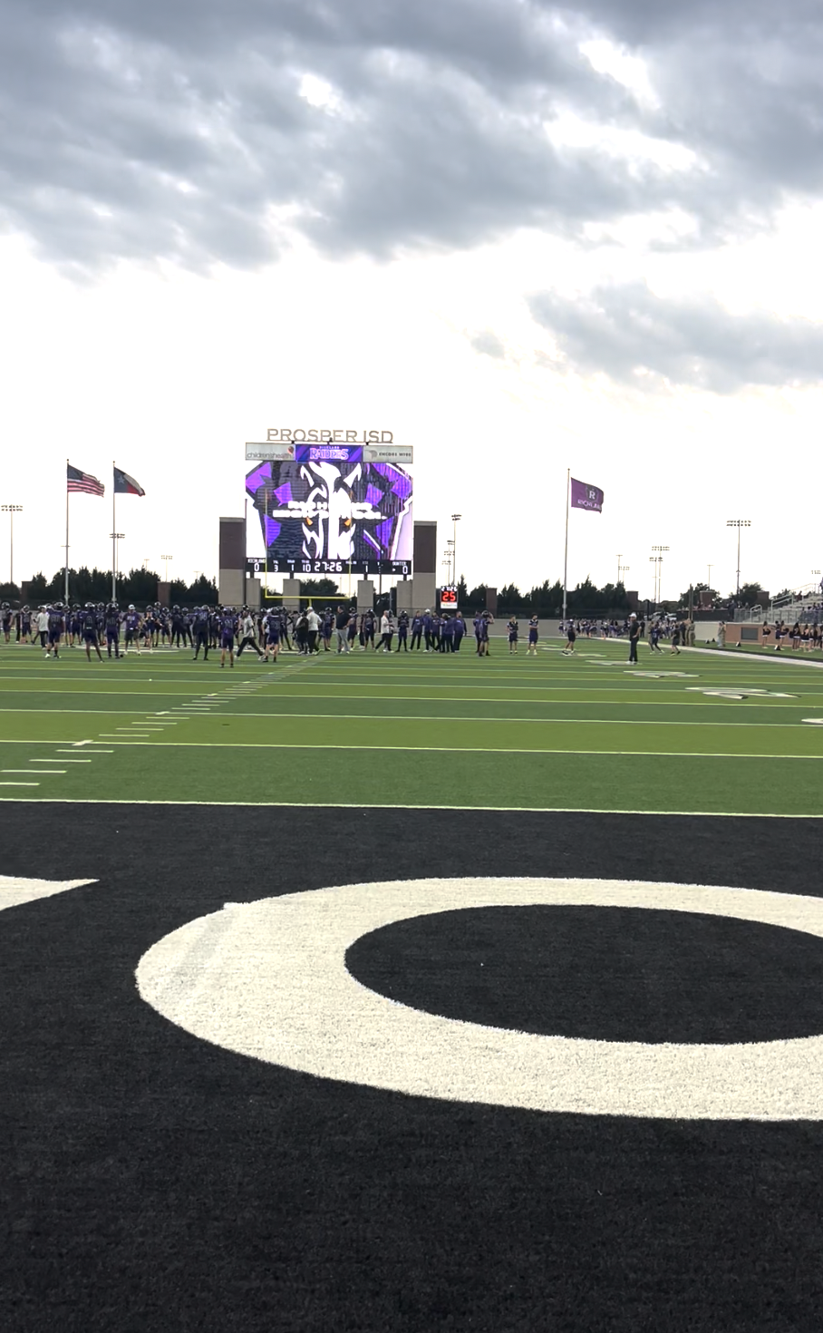 Prosper ISD football stadium scoreboard and field
