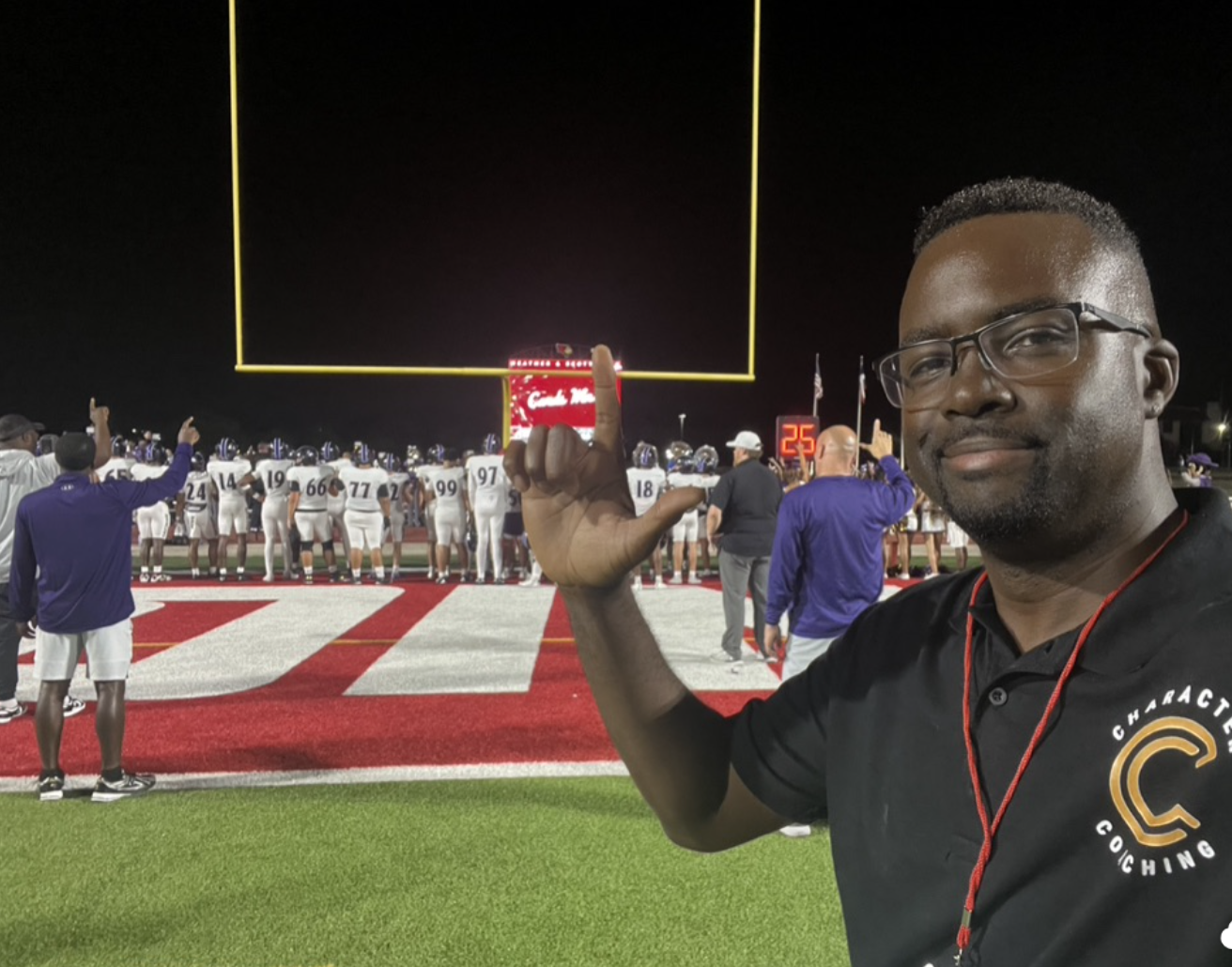 Tommy Wooten on the field at a Richland Raiders football game