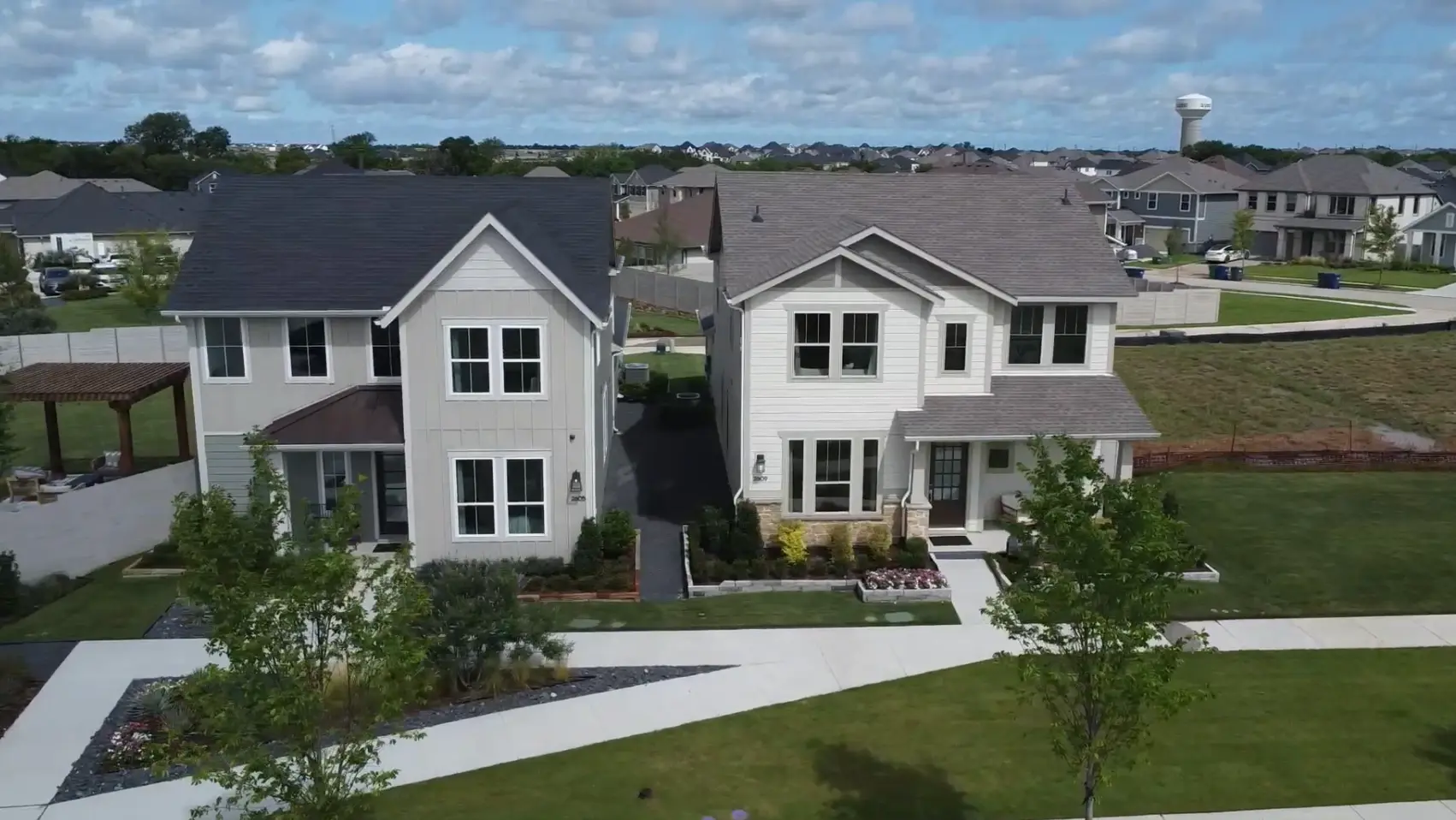 Painted Tree model homes and builder flags in McKinney Texas