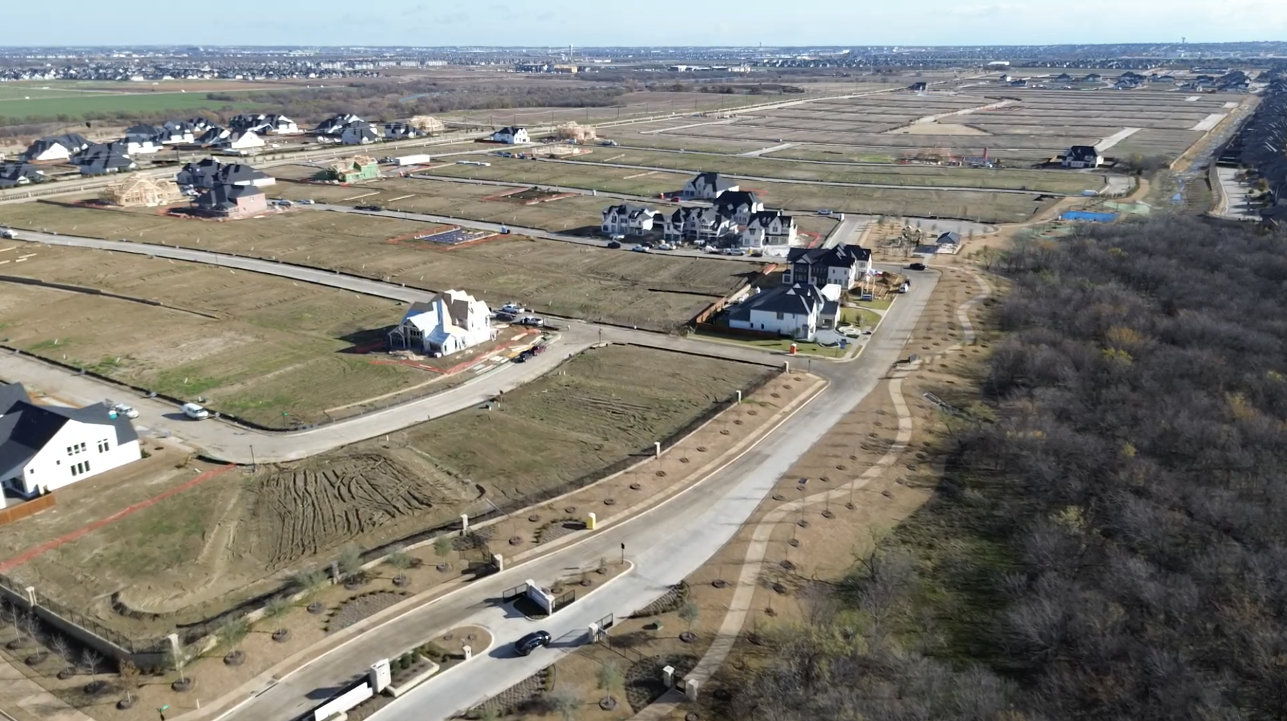 Aerial view of Park Place in Prosper, Texas showing available homesites and developed lots