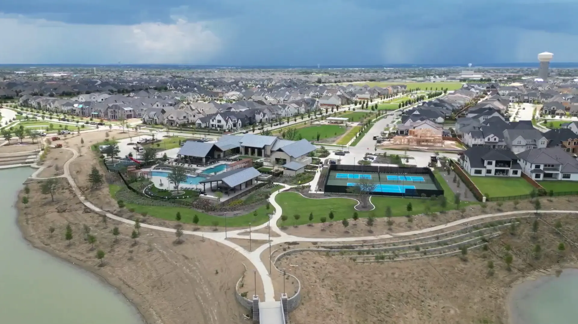 Aerial view of Brookside at Fields homes, amenity center, pool and pickleball courts